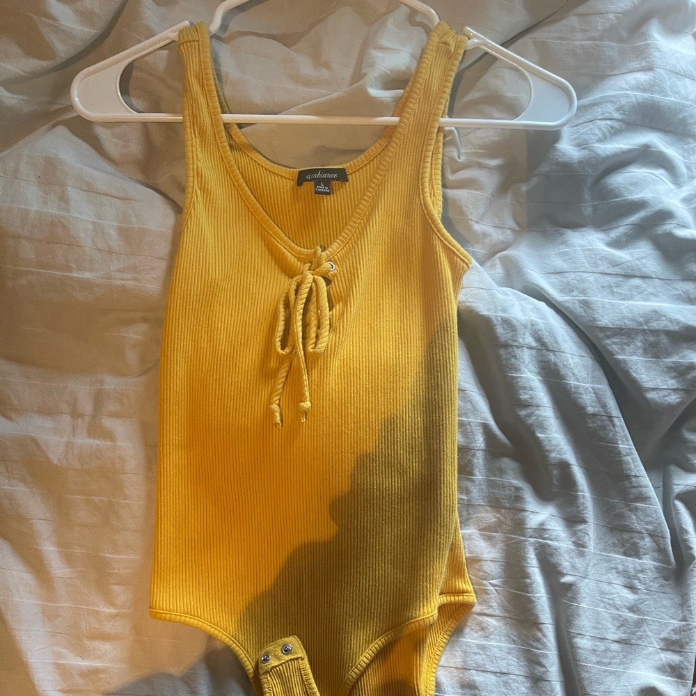 Yellow body suit